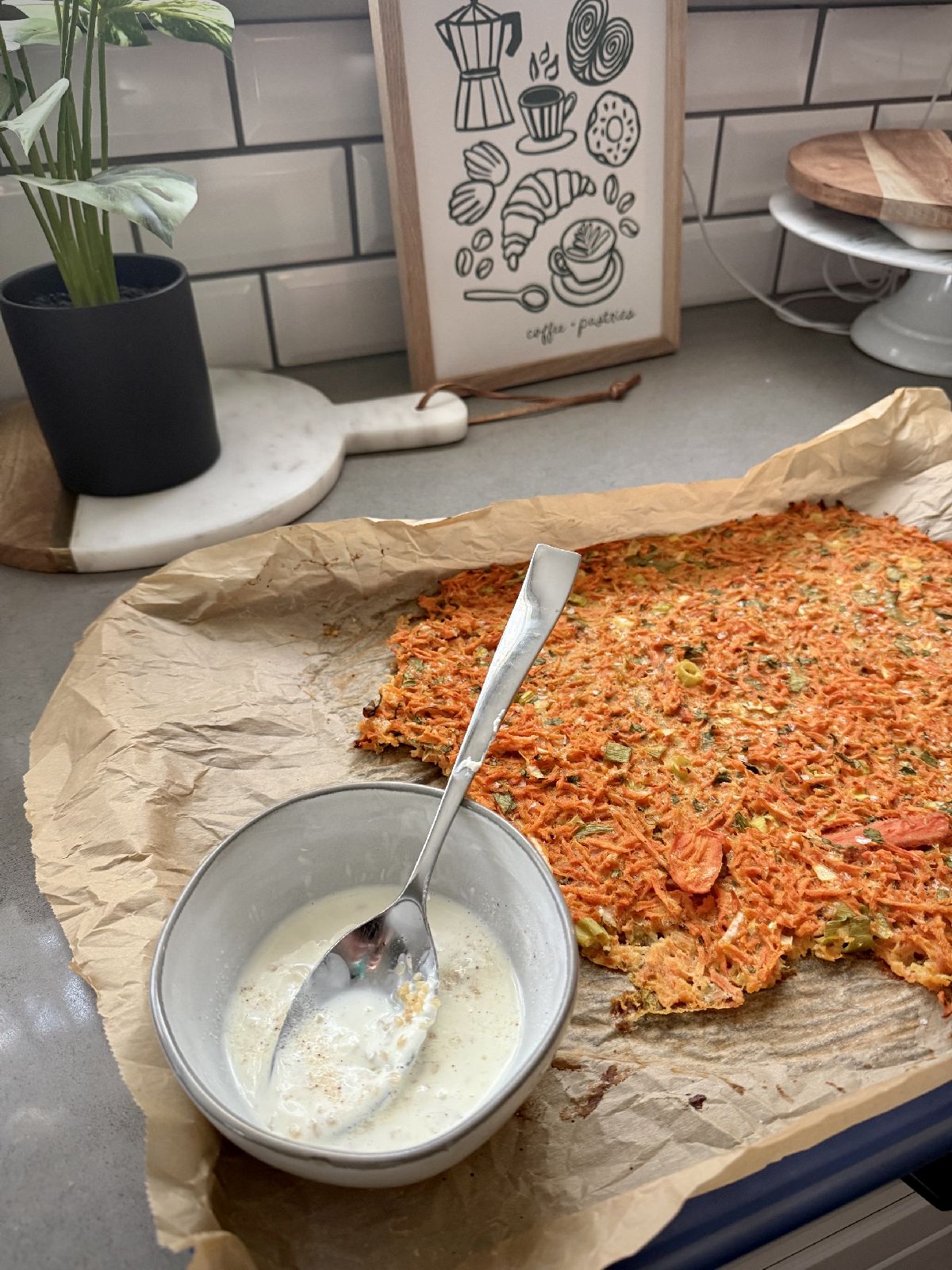 Carrot Scarpaccia with Tangy Garlic Yogurt Sauce | This carrot scarpaccia is a slight twist on the classic Italian vegetable flatbread (or tart, depending on how you look at it). It's super easy to make, healthy, delicious, and the perfect way to use up that bag of carrots languishing in your fridge! 