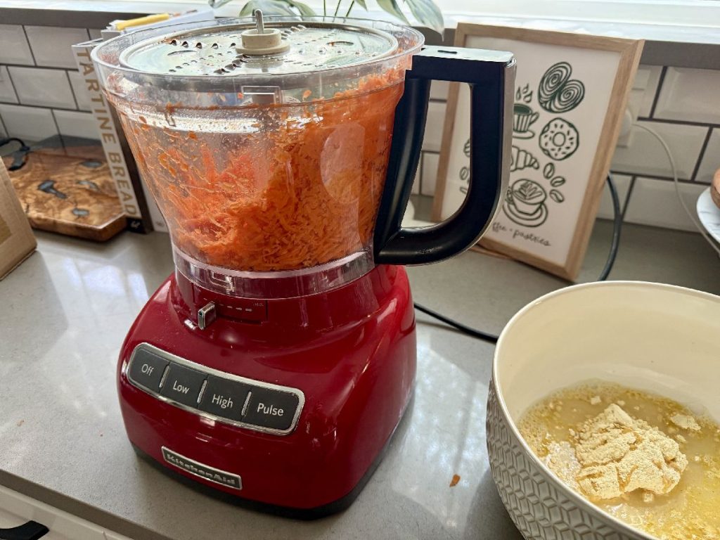 a food processor makes the carrot grating much easier for this carrot scarpaccia