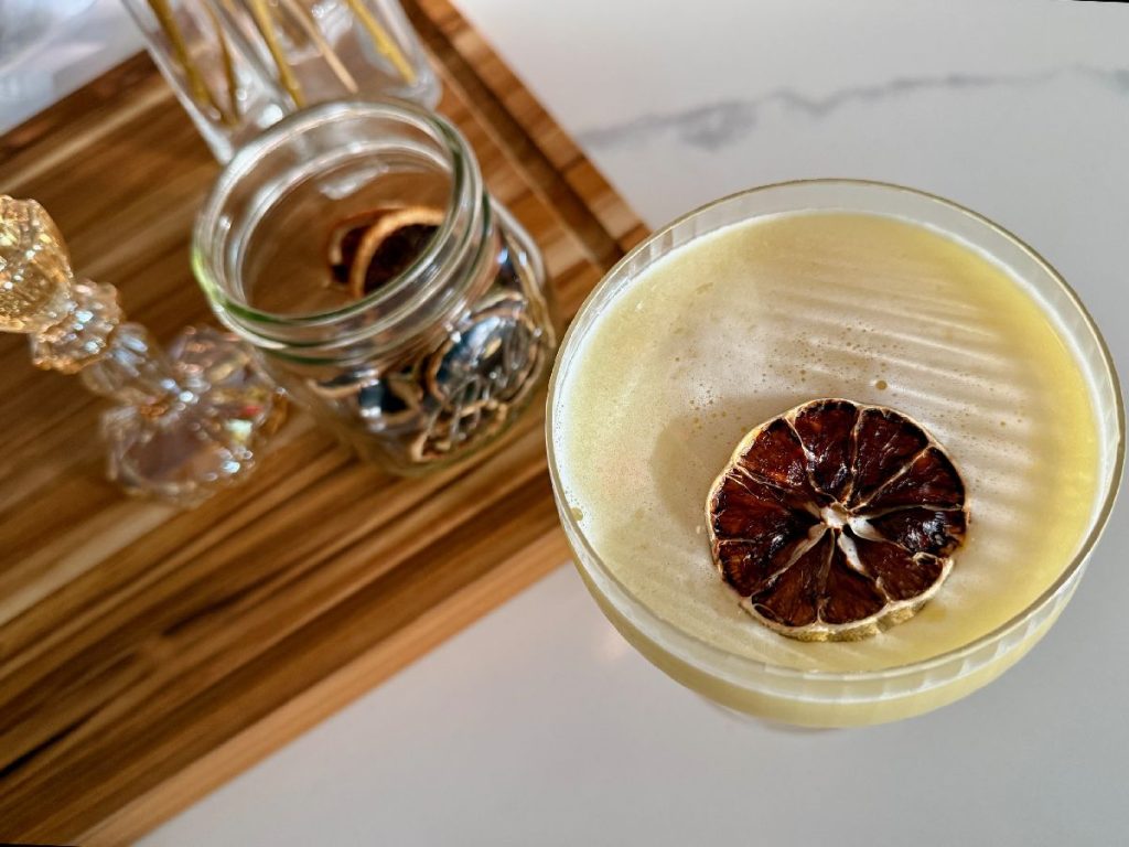 The Olivia is an easy but unique gin cocktail...similar to a Bee's Knees, with the sweeter honey and amaretto balancing out tart lemon juice. It's got a slight hit of olive oil, not as much for flavor but for texture and balance. The result is an interesting, delicious, super easy gin cocktail that's perfect for any occasion!