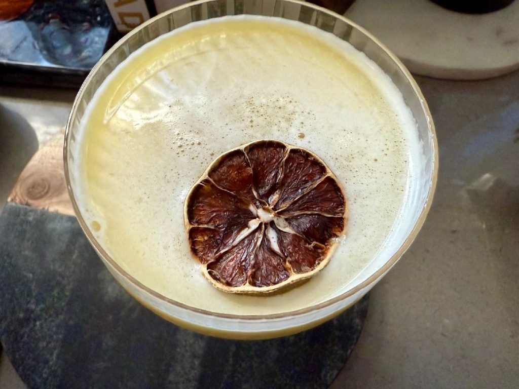 The Olivia is an easy but unique gin cocktail...similar to a Bee's Knees, with the sweeter honey and amaretto balancing out tart lemon juice. It's got a slight hit of olive oil, not as much for flavor but for texture and balance. The result is an interesting, delicious, super easy gin cocktail that's perfect for any occasion!