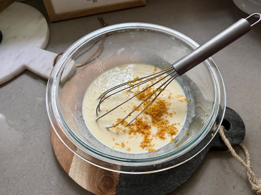 fresh orange zest in orange poppyseed pancake batter