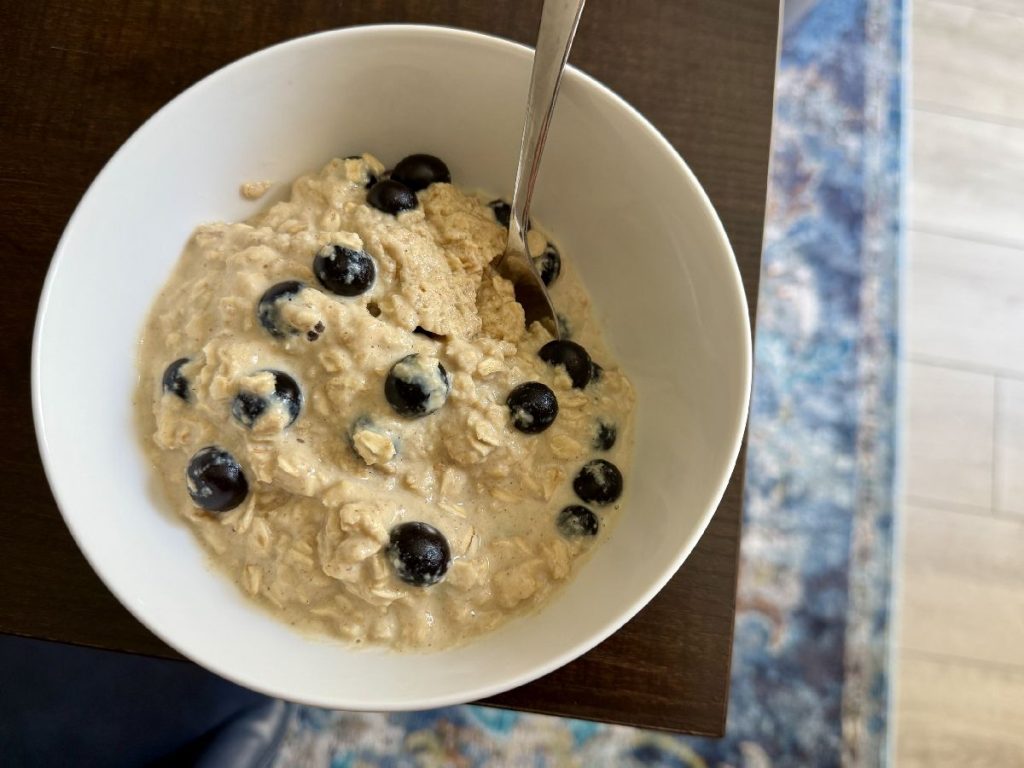 This custardy vanilla blueberry oatmeal has a secret ingredient--an egg added for texture and a bit of protein. 