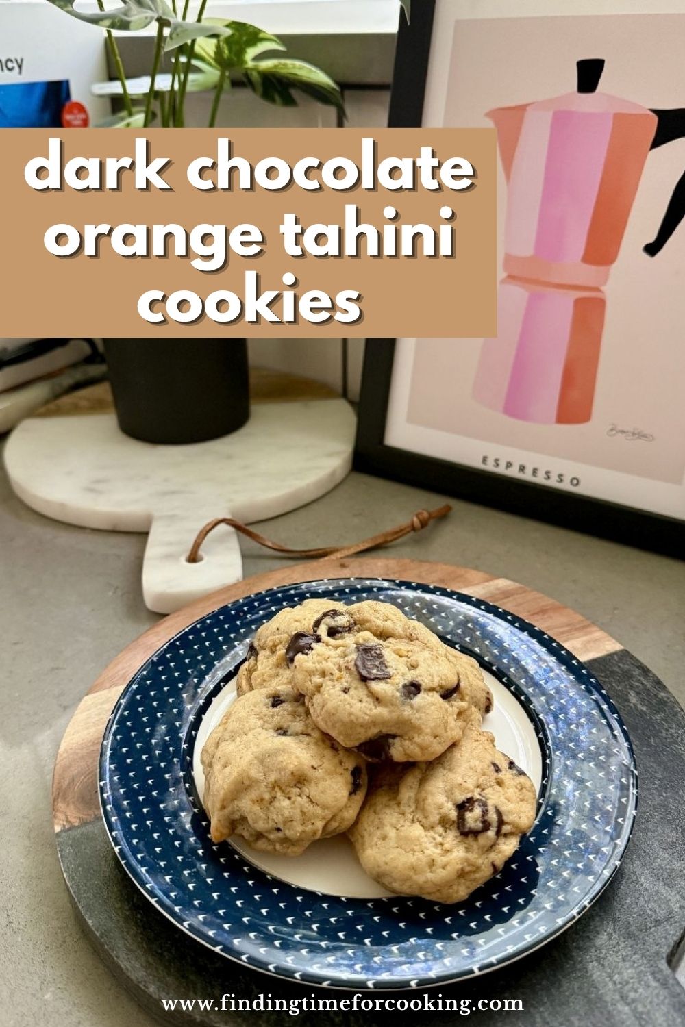 These orange tahini cookies with dark chocolate chunks are bursting with fresh orange flavor!  Paired with the dark chocolate and subtle tahini, they're a delicious twist on the traditional chocolate chip cookie, a total crowdpleaser.  Unique chocolate chip cookie recipe that everyone will love, Citrus chocolate chip cookies, a fun new cookie recipe to try.  #cookies #chocolatechip #dessertrecipe