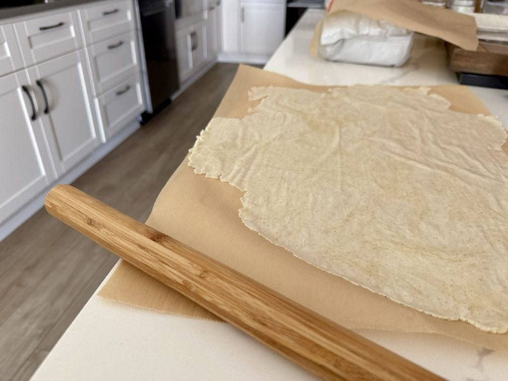 one of the keys to these thin crispy crackers is to roll the dough paper thin