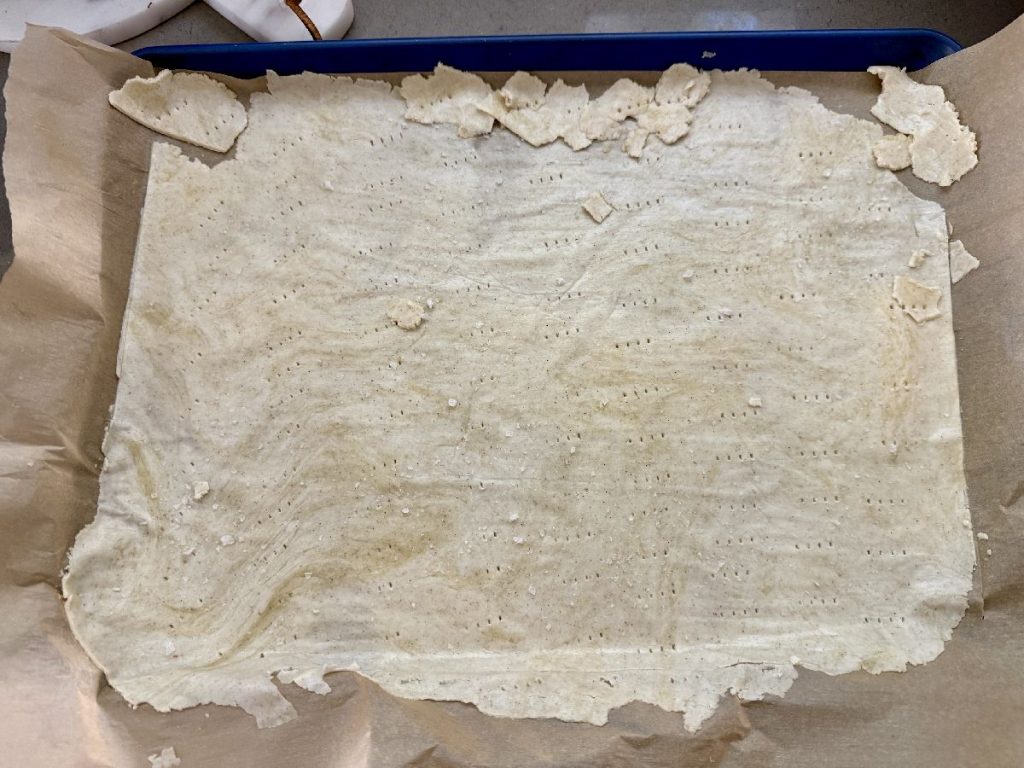 one of the keys to these thin crispy crackers is to roll the dough paper thin